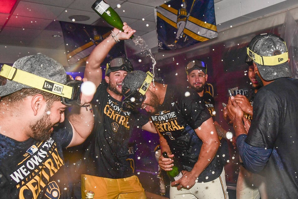 Milwaukee Brewers celebrates after beating the Philadelphia Phillies and winning the NL Central Division at American Family Field.