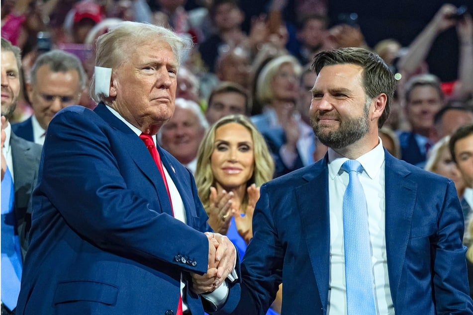 Republican presidential candidate Donald Trump (l.) and his running mate JD Vance during the Republican National Convention in Milwaukee, Wisconsin, on July 15, 2024.