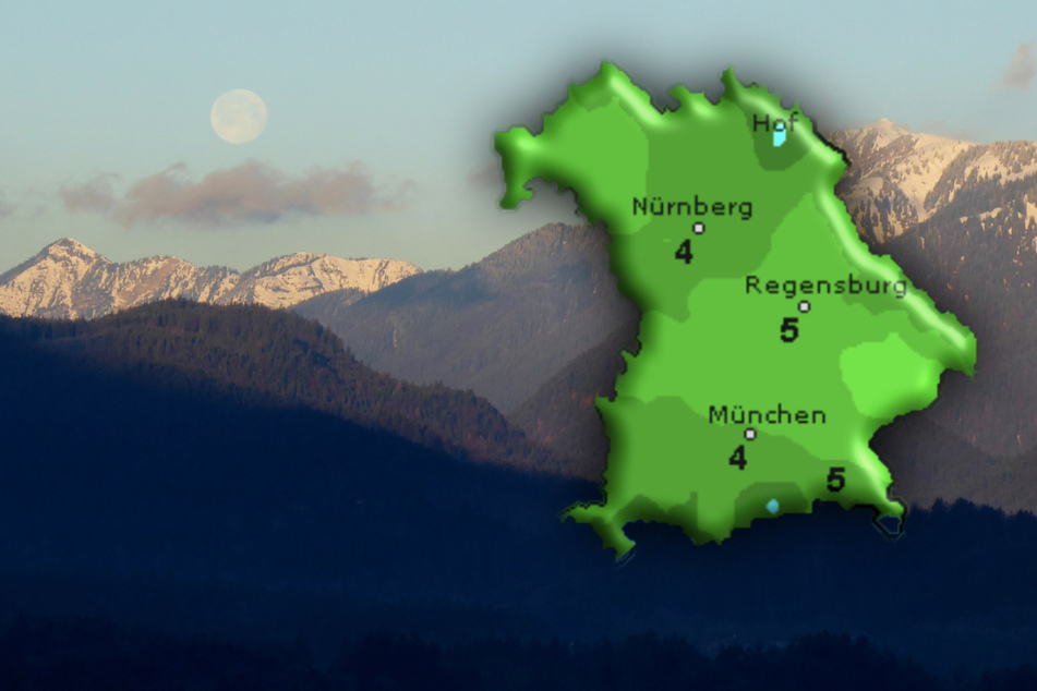 Der Vollmond geht am Morgen hinter dem Ammergauer Gebirge unter. Zum Ende der Woche wird es im Freistaat regnerisch und kälter.