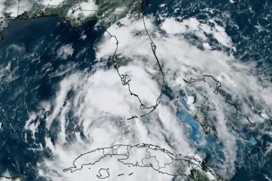 Some residents on Florida's Gulf coast have been ordered to evacuate as tropical storm Debby approaches hurricane force, with a likelihood of dumping "potentially historic" rainfall in the southeastern US, officials said Sunday.