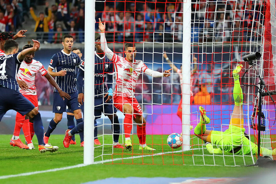 In there!  André Silva (2nd from right) headed the ball over the line to make it 1-0.