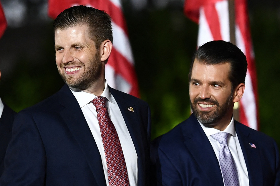 Eric (l.) and Donald Trump Jr. have been barred from leading any New York real estate company for two years.