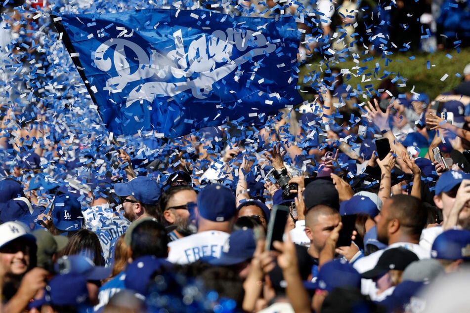 Tens of thousands of Los Angeles Dodgers fans celebrated a World Series title with a parade on Friday, the first time since 1988 they could offer such a salute to the squad.