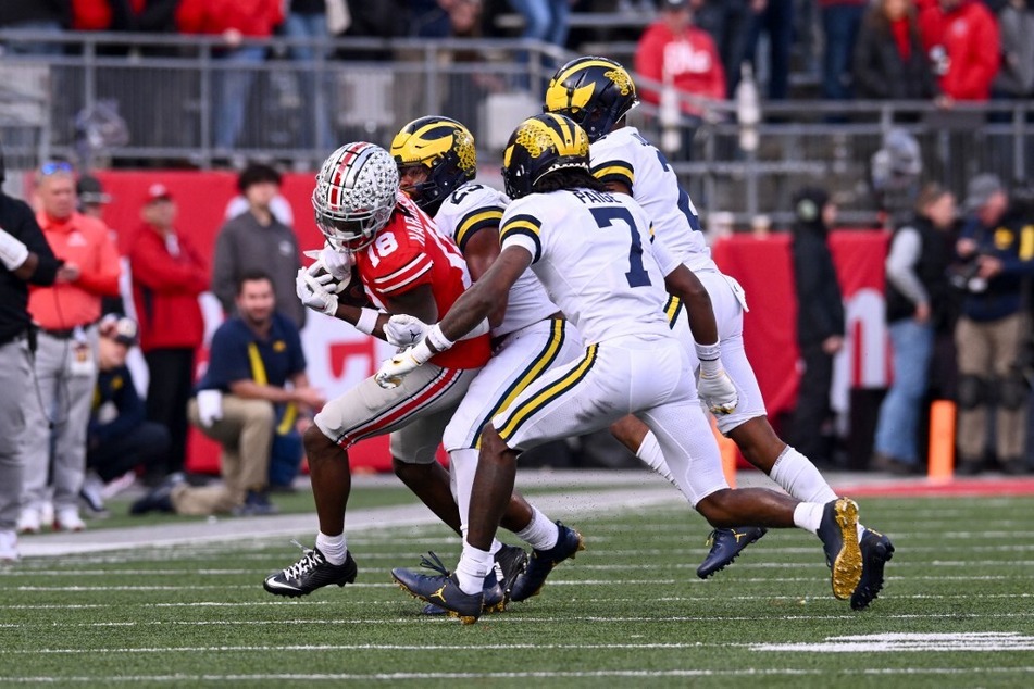 College football fans from all over expressed their displeasure with the viral Michigan clip of the team at Ohio State and didn't hesitate to voice their opinions.