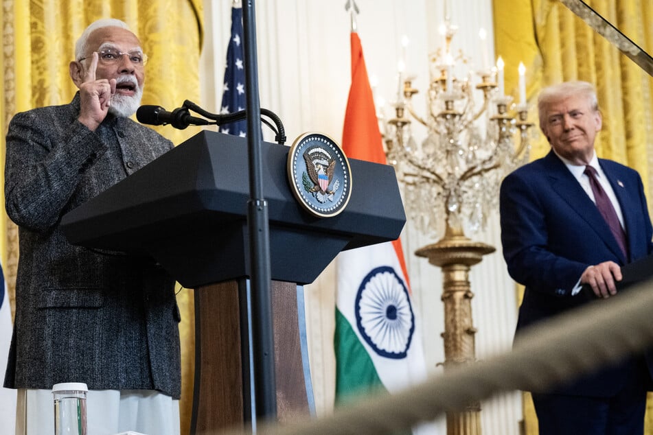 US President Donald Trump (r.) and Indian Prime Minister Narendra Modi hold a joint press conference in the East Room of the White House on February 13, 2025.
