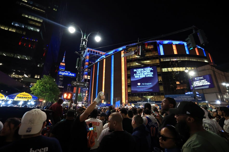 Basketball fans gather outside Madison Square Garden during Game 1 of the NBA Finals between the New York Knicks and the San Antonio Spurs, in New York City, on June 3, 2026.
