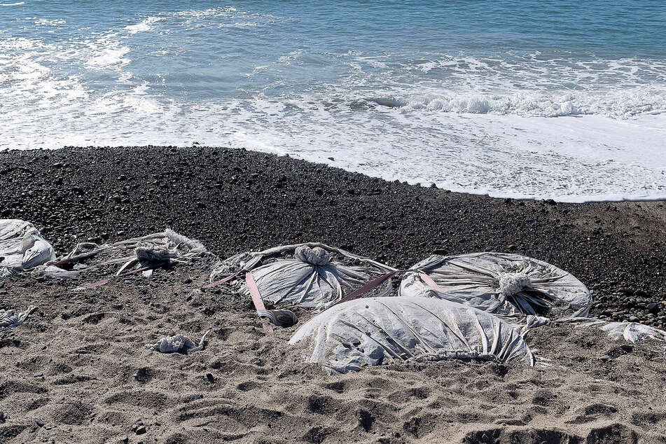 Giant sand bags can be a temporary solution to erosion. In California, coastal erosion took out a part of the Capistrano Beach that held a sidewalk, restrooms and a basketball court.