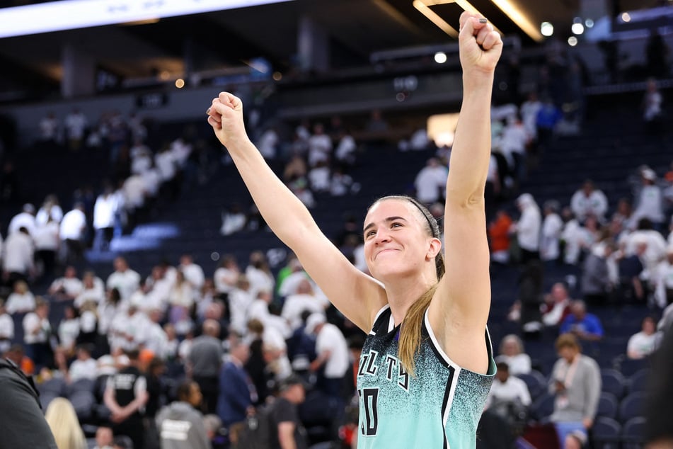 New York Liberty guard Sabrina Ionescu celebrates her team's win after game three of the 2024 WNBA Finals.