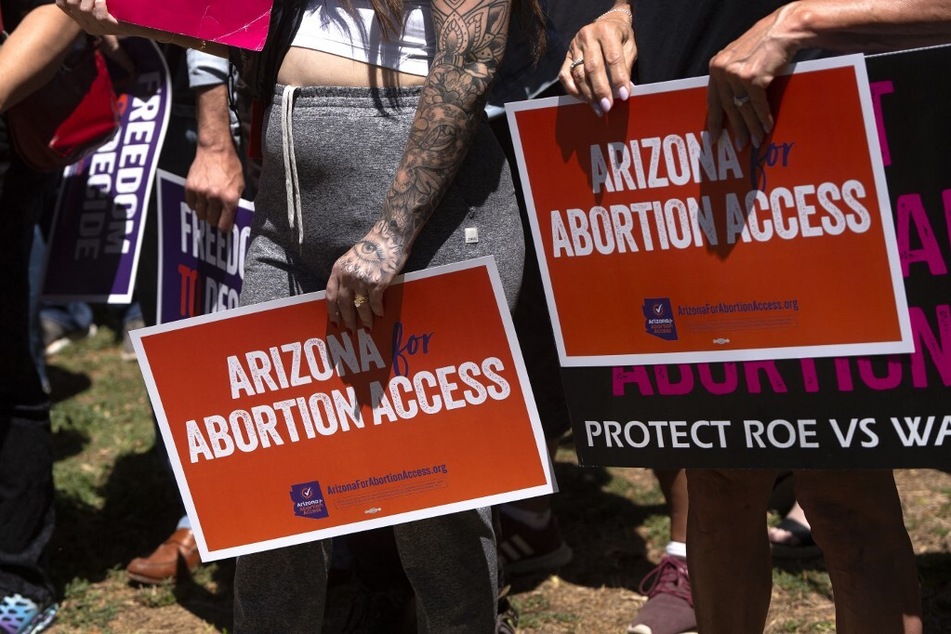 Members of Arizona for Abortion Access rally in support of a ballot initiative to enshrine abortion rights in the state constitution.