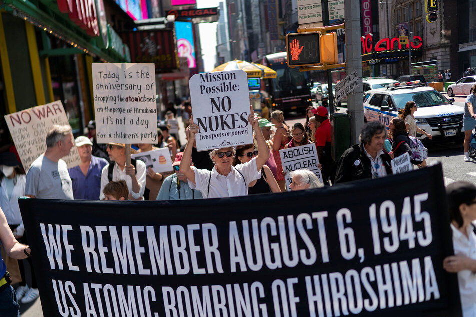 Anti-war demonstrators mark the 78th anniversary of the 1945 atomic bomb attack on Hiroshima with a march and protest from Times Square to the Intrepid museum in New York City.