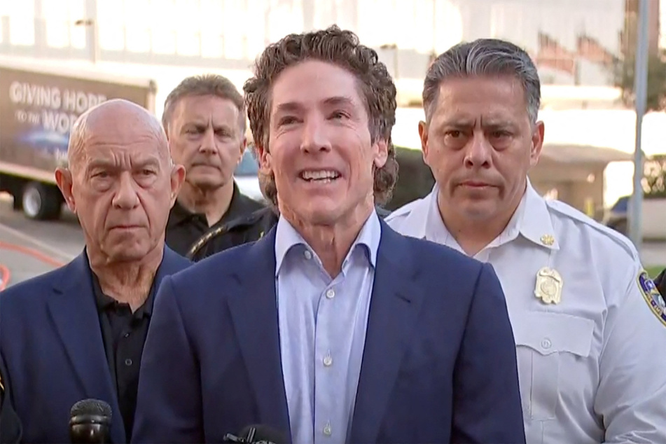 Joel Osteen speaks at a news conference with law enforcement officials after the shooting at his Lakewood Church.