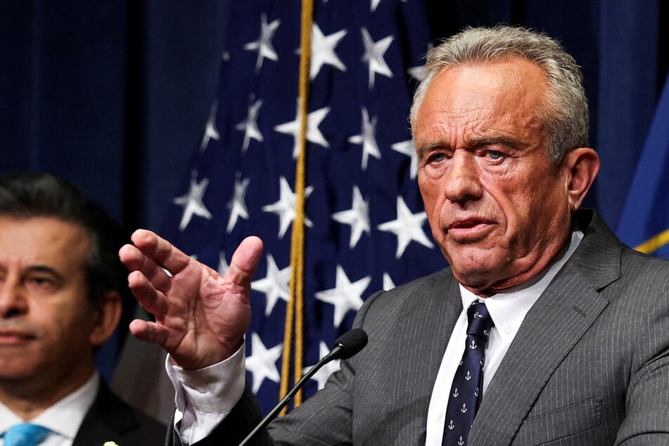 Hundreds of current and former health officials have accused Robert F. Kennedy Jr. of putting them at risk by spreading vaccine misinformation.