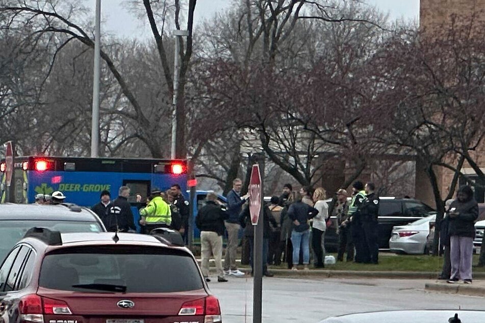 Concerned citizens and relatives wait outside the hospital where the injured have been admitted.