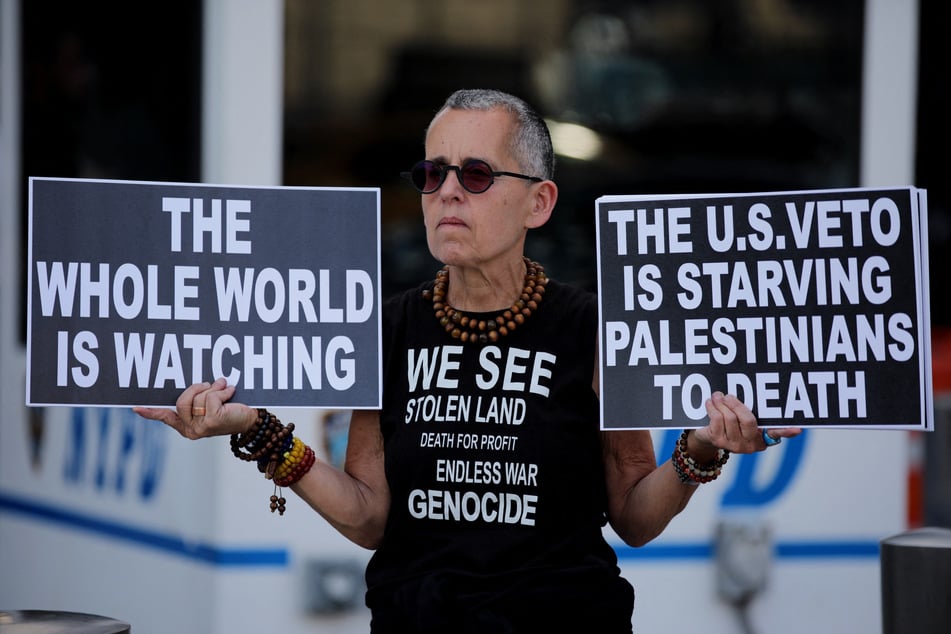 Demonstrators protest in support of Palestinians ahead of a United Nations Security Council meeting to vote on a resolution calling for a ceasefire and unrestricted humanitarian access in Gaza, outside the UN headquarters in New York City on Wednesday.