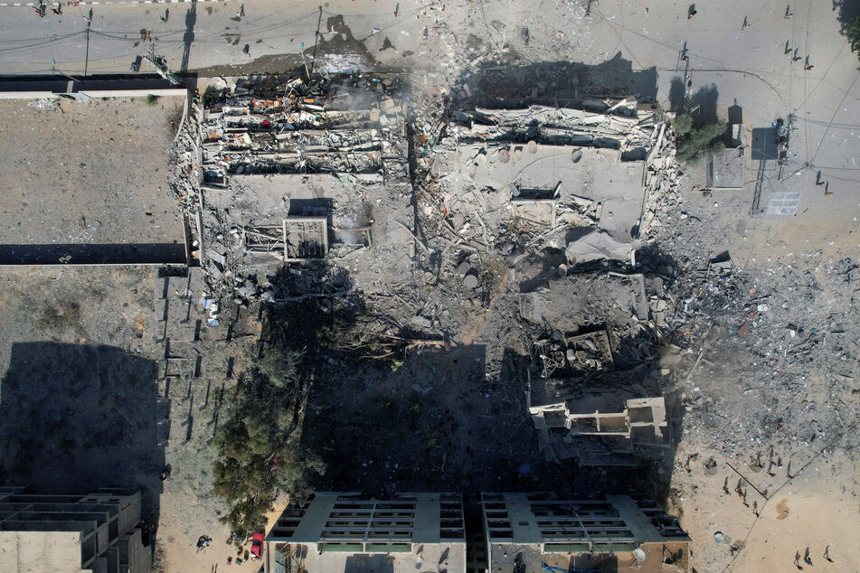 Israel's bombing campaign in Gaza continues, with residential buildings in the al-Zahra area of the strip leveled.