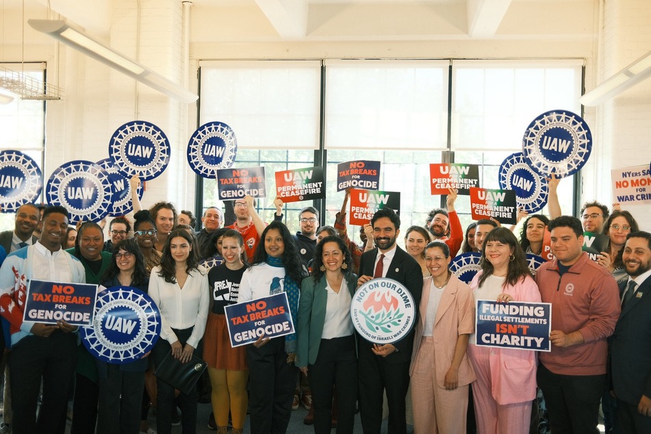 New York State lawmakers, Congresswoman Alexandria Ocasio-Cortez, and community groups come together to mark the relaunch of the Not On Our Dime! Act.