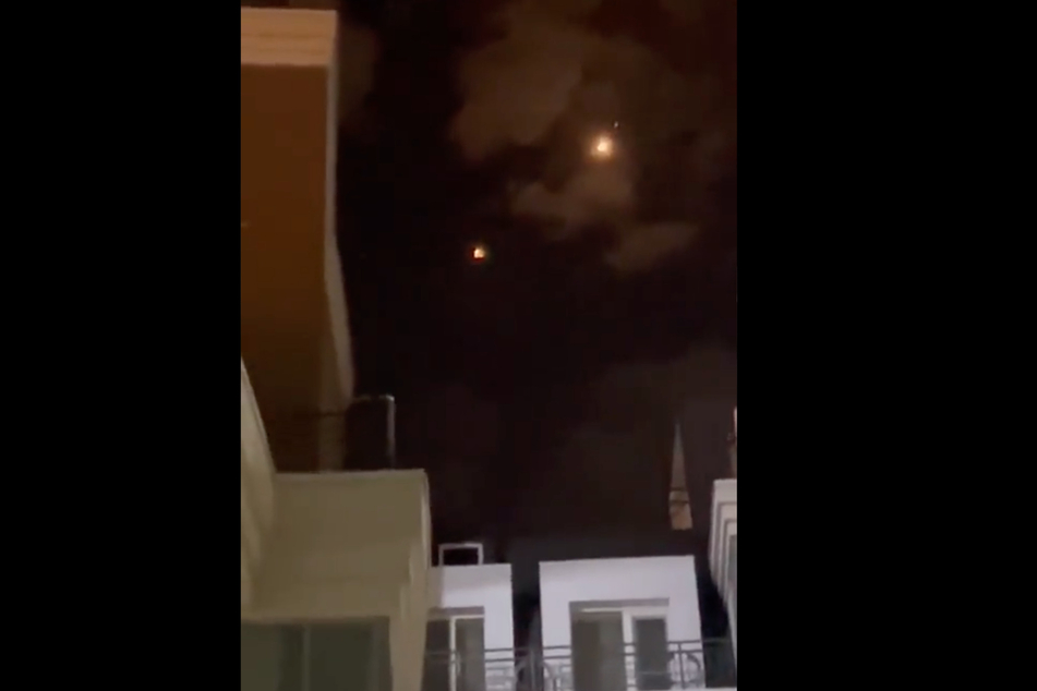 A still from a recording allegedly showing Ukrainian missiles falling on the Russian city of Belgorod.