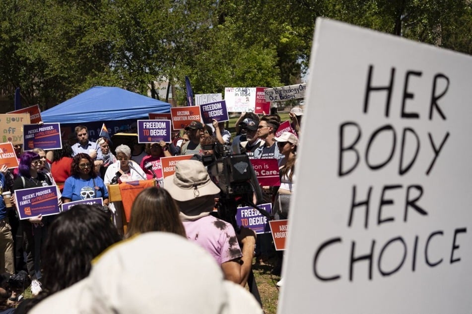 Members of Arizona for Abortion Access, the ballot initiative to enshrine abortion rights in the Arizona State Constitution, participate in a rally in Phoenix.