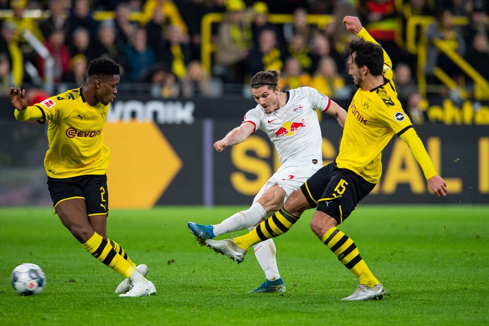 Ob gepfiffene Schwalbe oder glorreicher Sieg: Alle News zu Borussia Dortmund! (Foto: ©Guido Kirchner/dpa)