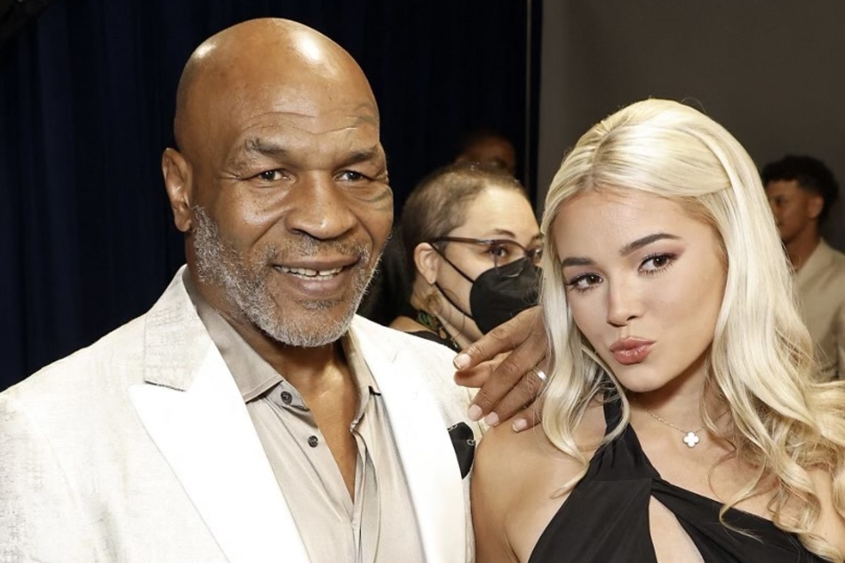 Olivia Dunne met legendary boxer Mike Tyson (l) at the 2023 ESPY Awards. and posed for a picture that landed on her Instagram.