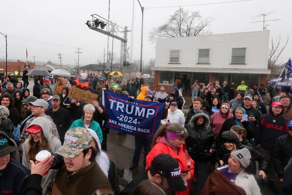 Donald Trump supporters cheered his arrival in the village of East Palestine, Ohio on Wednesday.