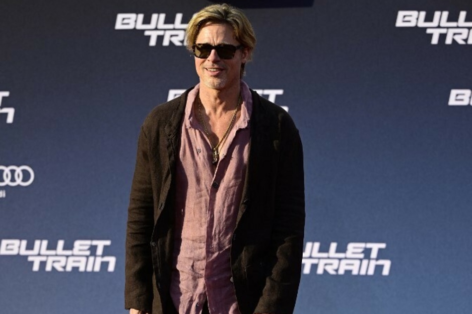 Brad Pitt was all smiles while attending the red carpet premiere of his newest film, Bullet Train.