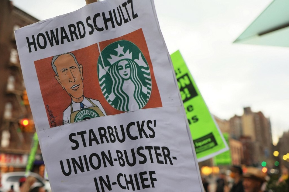Protesters rally against Starbucks' union-busting as more and more of the coffee company's stores file for union elections.