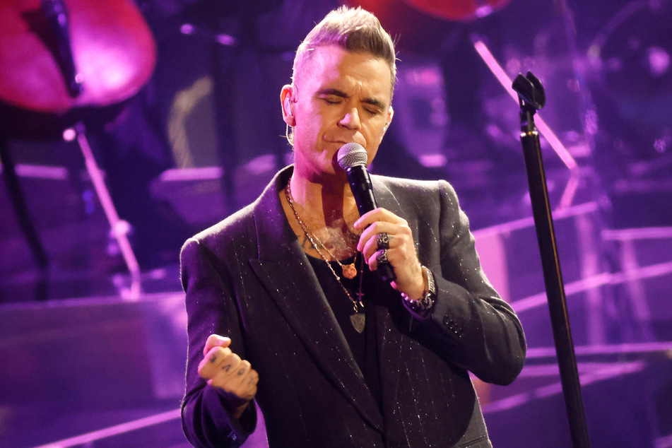 Robbie Williams bei einem Auftritt in der Fernsehsendung "Wetten, dass..?" im November 2022.