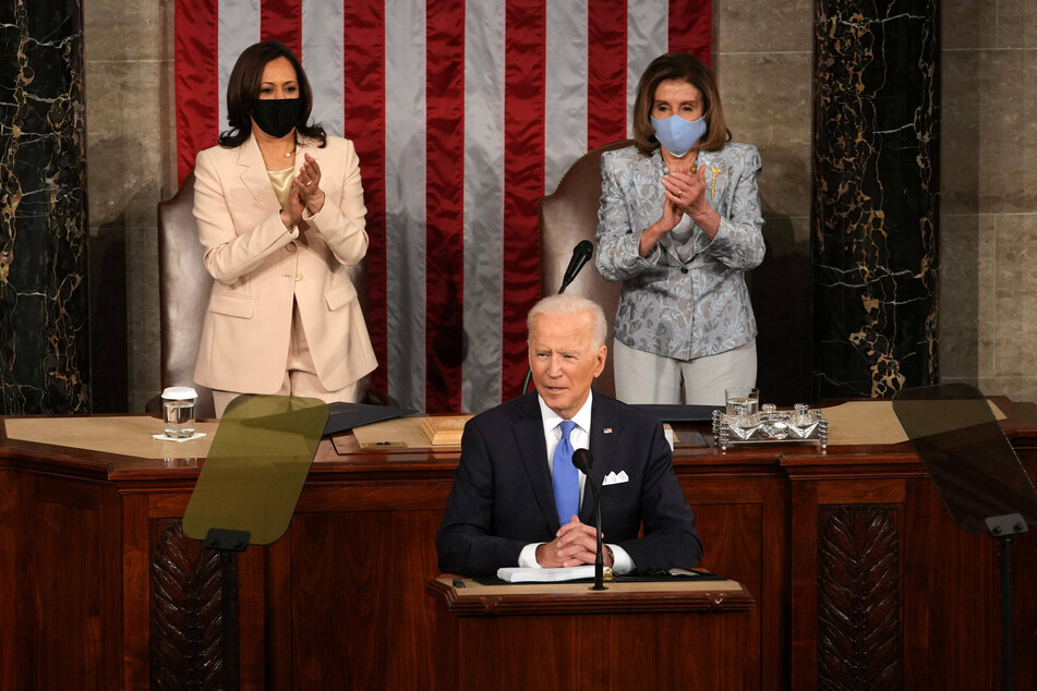 Wednesday marked the first time a female vice president (l.) and female Speaker of the House (r.) stood together on the podium during a joint address to Congress.