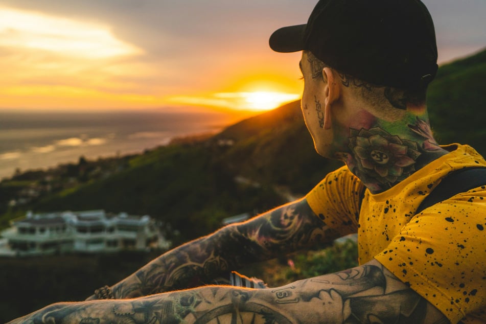 A man lost all of his hair, as well as his ability to sweat, after a tattoo job on his forearm triggered a rare medical condition. (Stock Image)