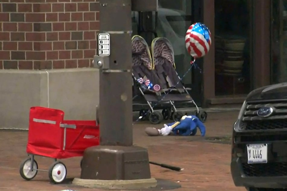 Toys, strollers, and other personal belongings were abandoned as parade-goers ran for cover when the shooting started.
