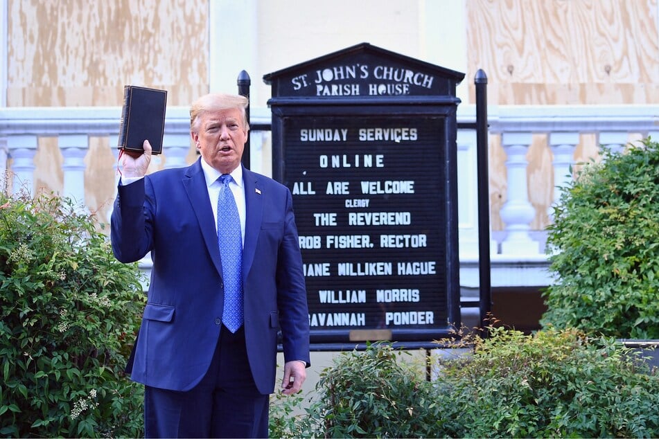 President Donald Trump holding up a Bible outside of St John's Episcopal church across Lafayette Park in Washington, DC on June 1, 2020.