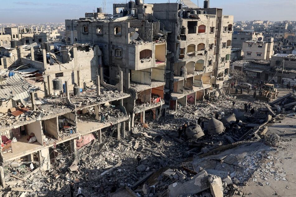 A destroyed building and the rubble of the al-Faruq mosque are shown on February 22, 2024, following an overnight Israeli air strike on the Rafah refugee camp in the southern Gaza Strip.
