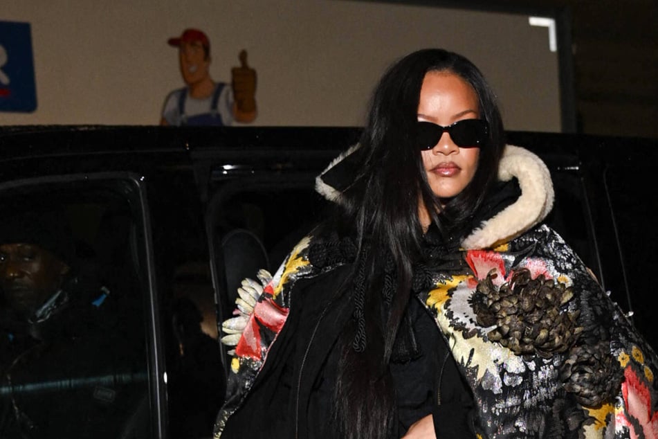 Rihanna accidentally flashes her naked bottom to paparazzi at A$AP Rocky's fashion show!