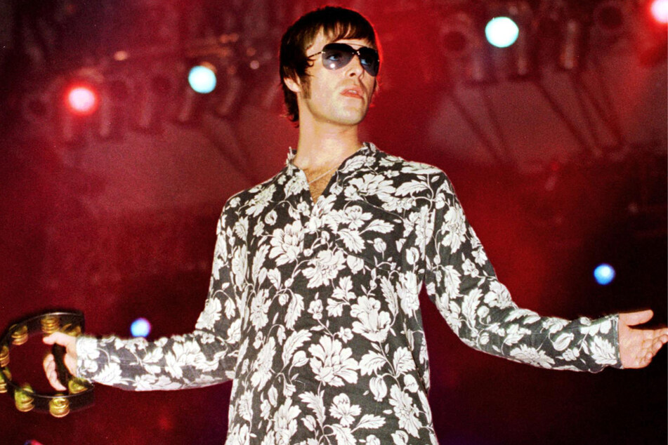 Liam Gallagher has stirred up rumors of an Oasis reunion by writing, "I never did like that word FORMER."