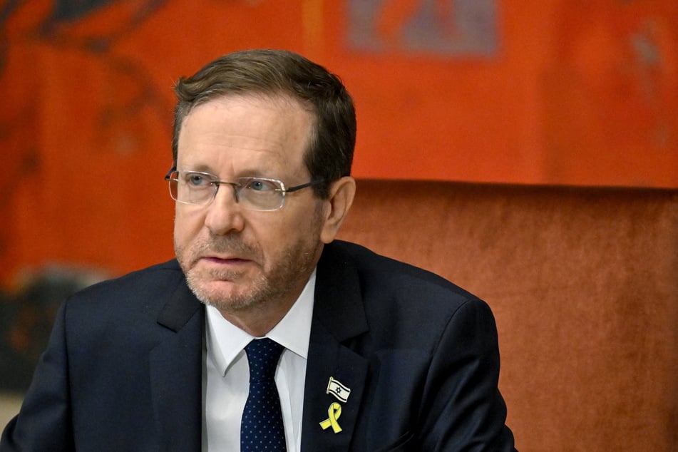 Israeli President Isaac Herzog called Iran an "ongoing threat" after Tehran, which backs armed groups across the Middle East, launched around 200 missiles at Israel on Tuesday.