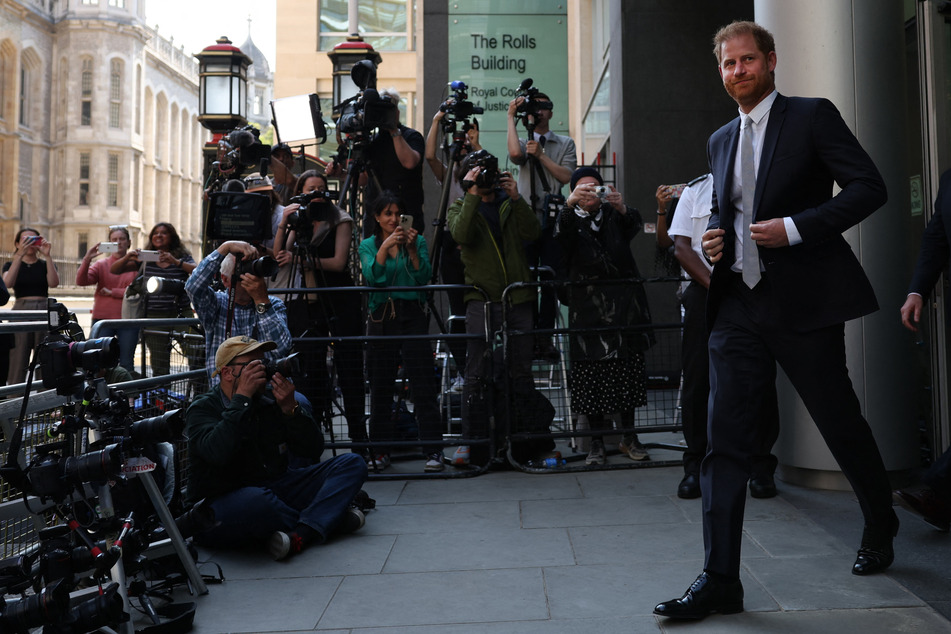 The cameras were still on Prince Harry as he left court in London after testifying in his court case against the British press in June.