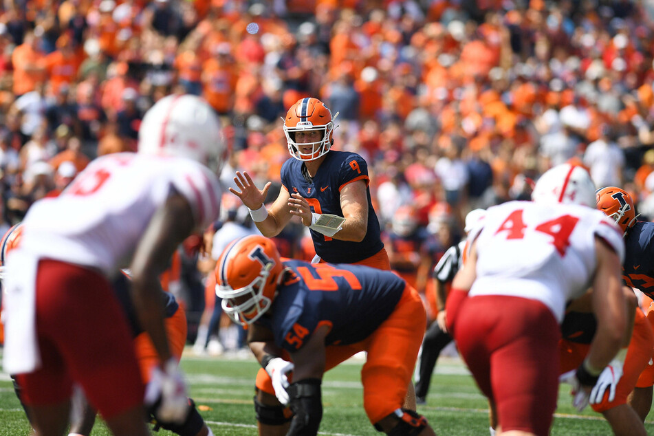 Illinois quarterback Artur Sitkowski (c.) stepped in to throw two touchdowns in the win over Nebraska on Saturday afternoon.