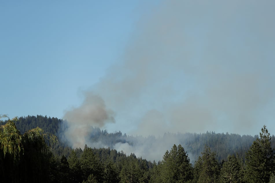 Smoke rises after multiple firefighters were attacked when responding to a fire in the Canfield Mountain area outside Coeur d'Alene, Idaho, U.S. June 29, 2025.