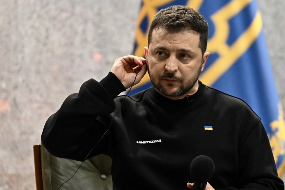 Ukrainian President Volodymyr Zelensky gives a press conference in Kyiv on the first anniversary of the Russian invasion of Ukraine.