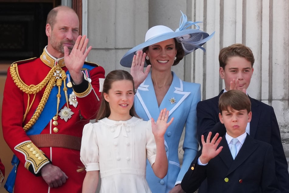 (From l. to r.) Prince William, Princess Charlotte, Princess Catherine, Prince George (top), and Prince Louis pictured together earlier this month.