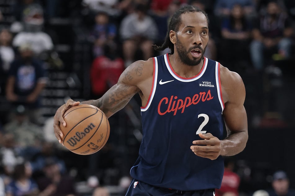 Kawhi Leonard of the Los Angeles Clippers controls the ball against the Toronto Raptors in the second half at Intuit Dome on March 25, 2026.