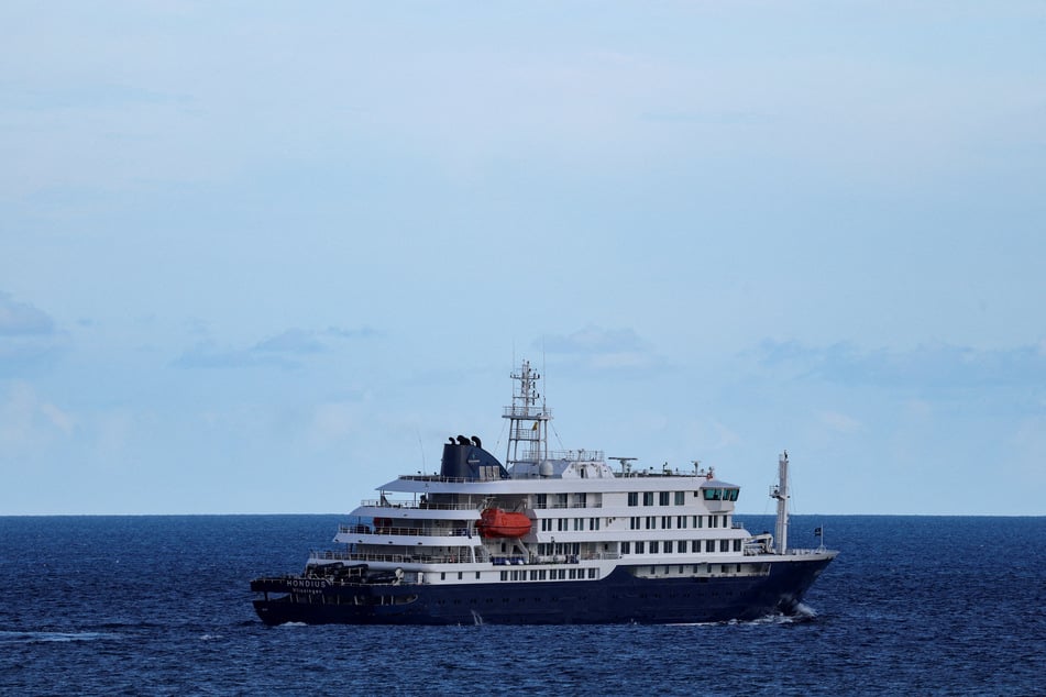 The cruise ship MV Hondius, affected by a hantavirus outbreak, leaves the port of Granadilla de Abona, in Tenerife, Spain, on May 11, 2026.