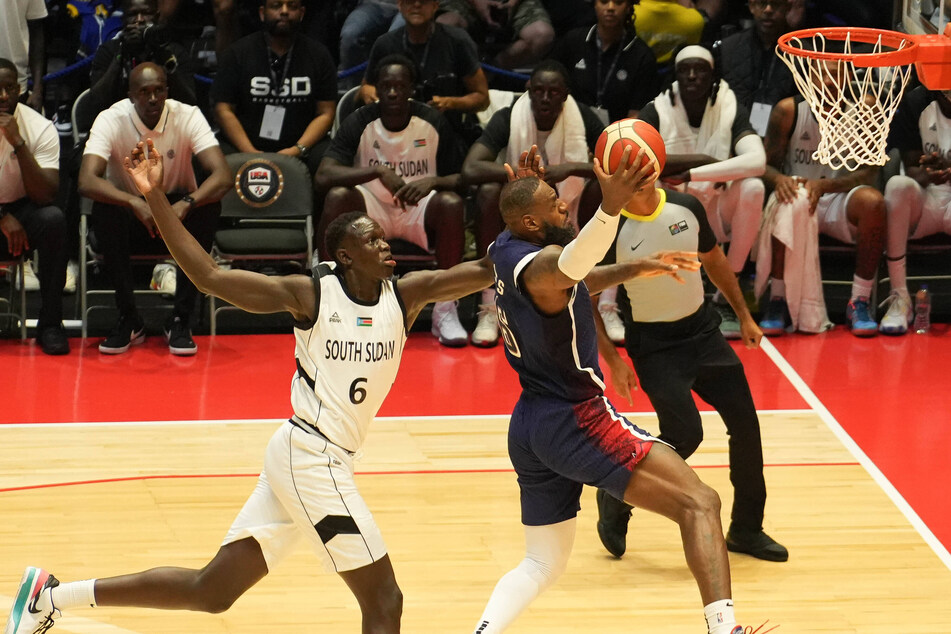 Lebron James shoots during a friendly game between Team USA and South Sudan ahead of the 2024 Paris Olympics.