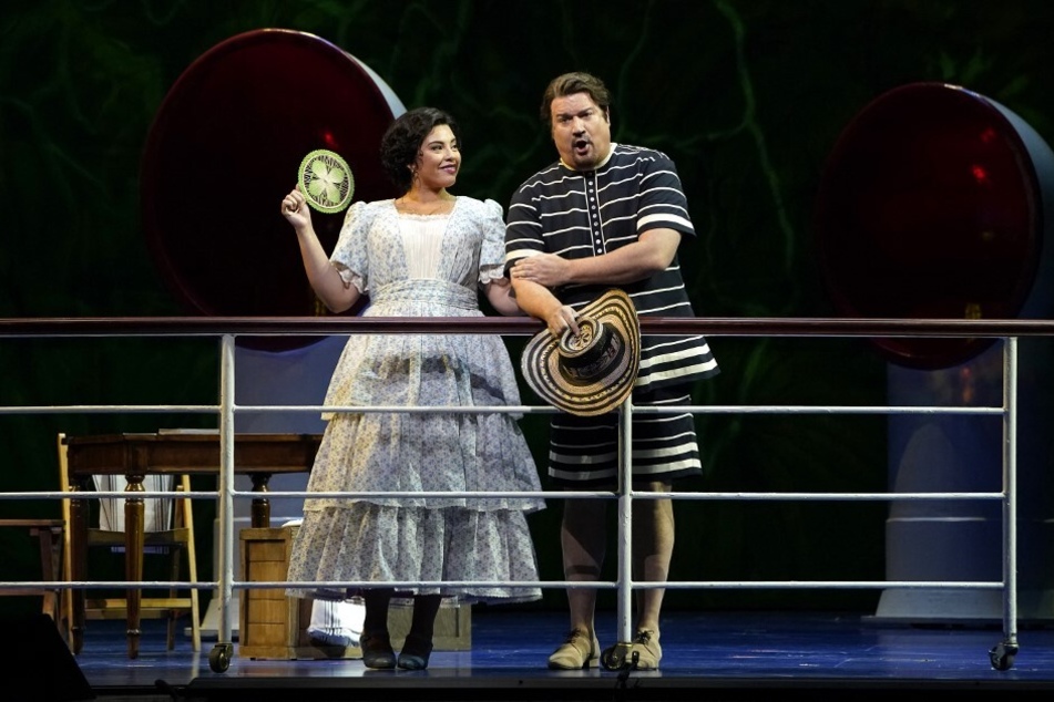 Gabriella Reyes, performing as journalist Rosalba, and baritone Michael Chioldi, performing as Alvaro, take part in a dress rehearsal of Florencia en el Amazonas.