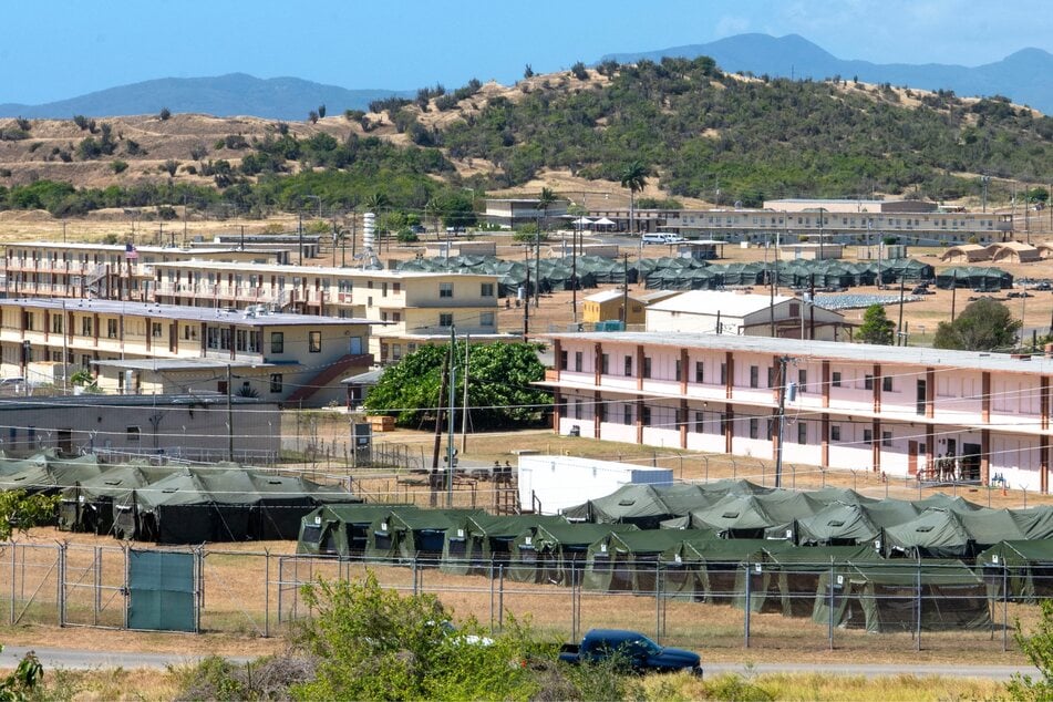 Trump administration returns migrants being held at Guantánamo Bay back to the US