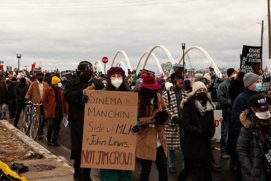 Protesters march for voting rights in Washington DC on Martin Luther King Jr. Day.