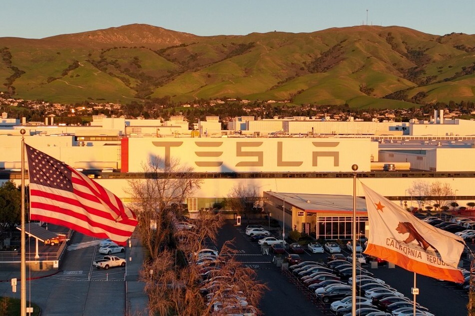 Tesla to pay millions to former Black employee in racial harassment lawsuit