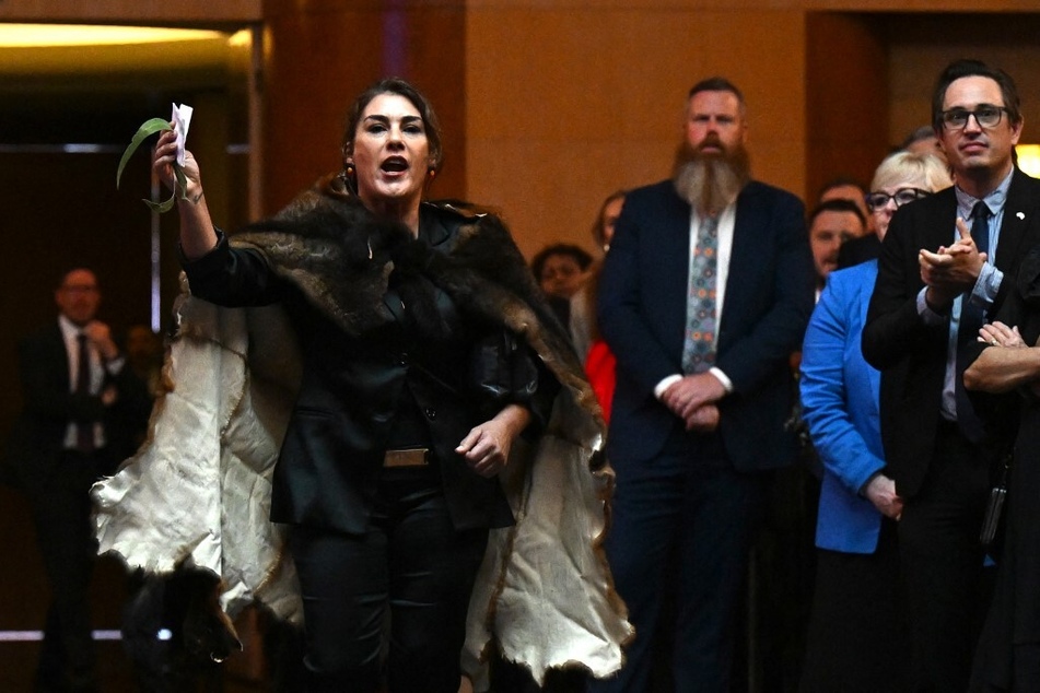 Australian Senator Lidia Thorpe disrupts proceedings as Britain's King Charles III and Queen Camilla attend a Parliamentary reception in Canberra on October 21, 2024.