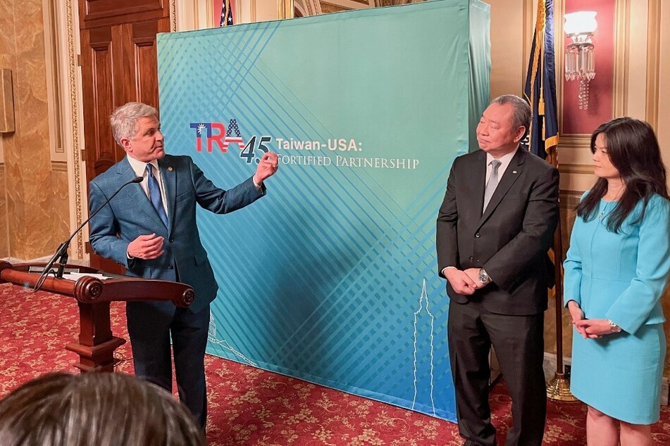 Representative Mike McCaul (l.) addresses an event marking the 45th anniversary of the Taiwan Relations Act alongside Taiwan’s representative in Washington, Alexander Tah-Ray Yui (c.), and Yui’s wife Karen Lo at the US Capitol on March 6, 2024.